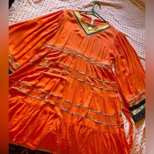 Beautiful dress. Size medium. Pink/orange color.